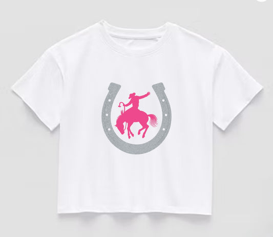 “If It Bucks, I’m In” Rodeo Crop Tee – Glitter & Grit Edition